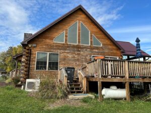 worn log cabin needs repair
