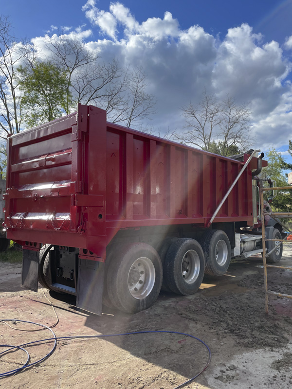 Dump truck rust removal and painting
